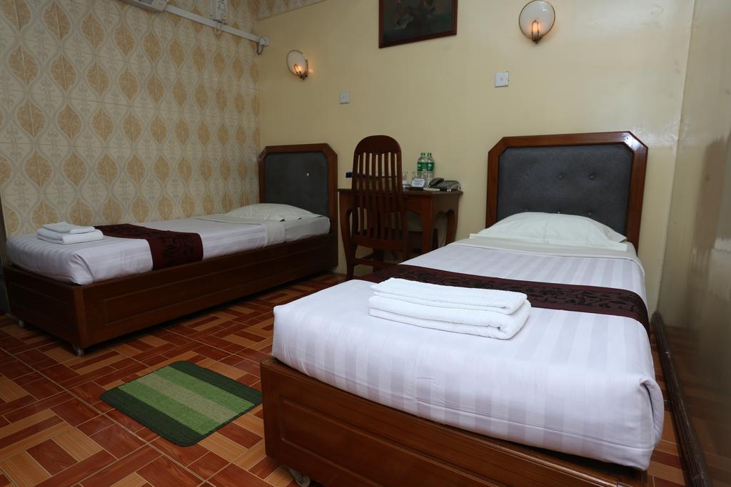 Beautyland Hotel II Янгон Стая снимка